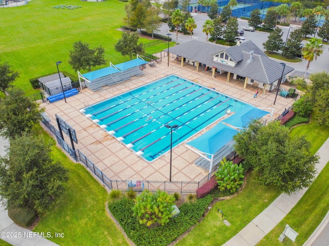 pool featuring a patio and fence