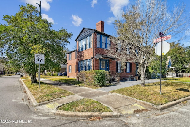 758 Acosta St, Jacksonville, FL 32204 - view of front facade with a front lawn