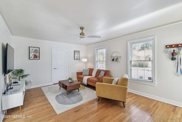 758 Acosta St, Jacksonville, FL 32204 - living room featuring ornamental molding, ceiling fan, and light wood-type flooring