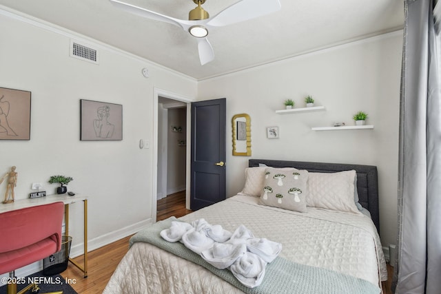 758 Acosta St, Jacksonville, FL 32204 - bedroom featuring hardwood / wood-style floors, crown molding, and ceiling fan