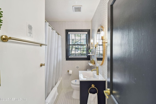 758 Acosta St, Jacksonville, FL 32204 - full bathroom featuring vanity, tile patterned flooring, toilet, and shower / bath combo with shower curtain