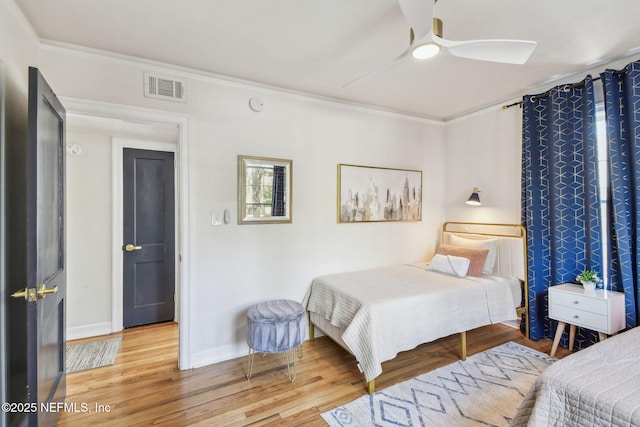 758 Acosta St, Jacksonville, FL 32204 - bedroom featuring hardwood / wood-style floors, crown molding, and ceiling fan