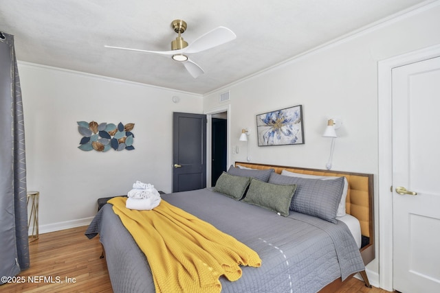 758 Acosta St, Jacksonville, FL 32204 - bedroom featuring crown molding, ceiling fan, and hardwood / wood-style floors