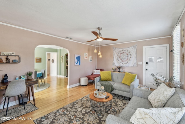 758 Acosta St, Jacksonville, FL 32204 - living room featuring hardwood / wood-style flooring, crown molding, and ceiling fan