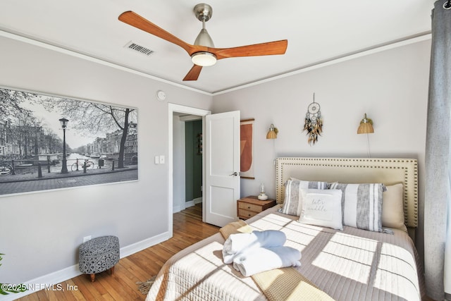 758 Acosta St, Jacksonville, FL 32204 - bedroom with crown molding, hardwood / wood-style flooring, and ceiling fan