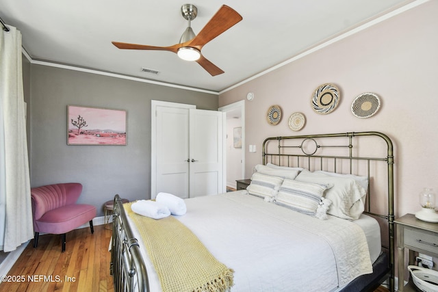 758 Acosta St, Jacksonville, FL 32204 - bedroom featuring hardwood / wood-style floors, ornamental molding, and ceiling fan