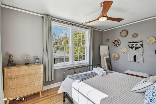 758 Acosta St, Jacksonville, FL 32204 - bedroom with crown molding, ceiling fan, and hardwood / wood-style flooring