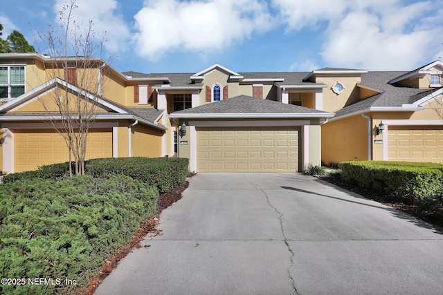 view of front of property featuring stucco siding and an attached garage