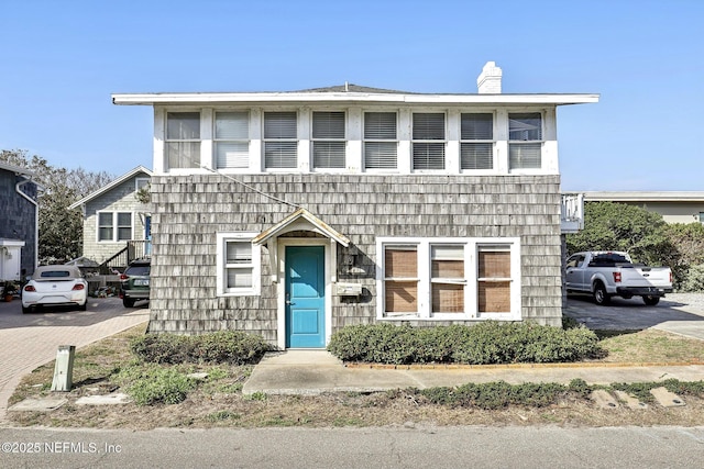 multi unit property featuring a chimney