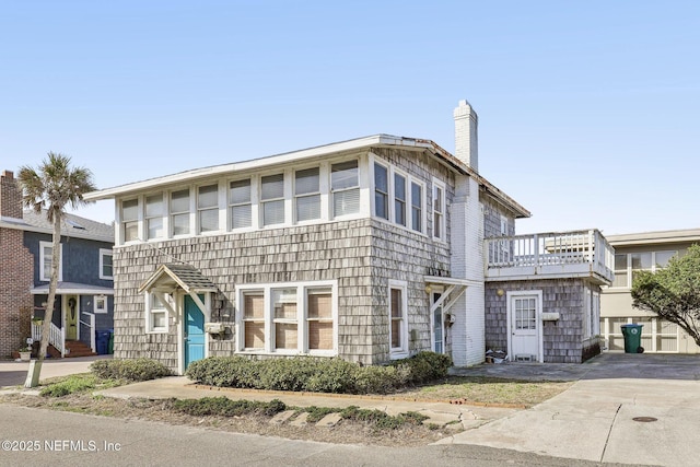 view of front of property with a chimney