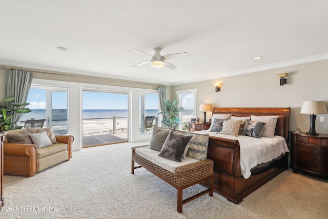 carpeted bedroom featuring recessed lighting, a water view, ornamental molding, ceiling fan, and access to outside