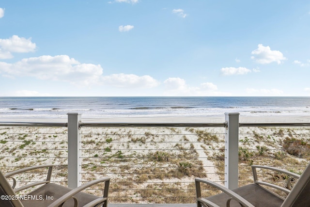 property view of water featuring a beach view