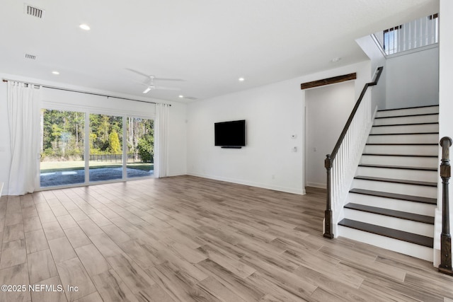 unfurnished living room featuring a ceiling fan, recessed lighting, visible vents, and light wood-style flooring