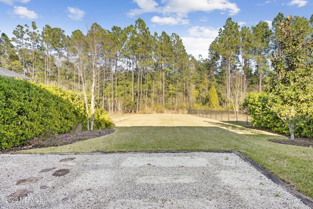 view of yard featuring fence