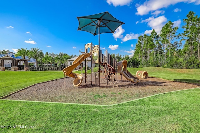 community play area featuring a yard