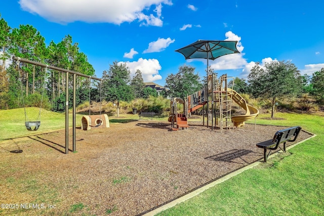 community jungle gym featuring a lawn