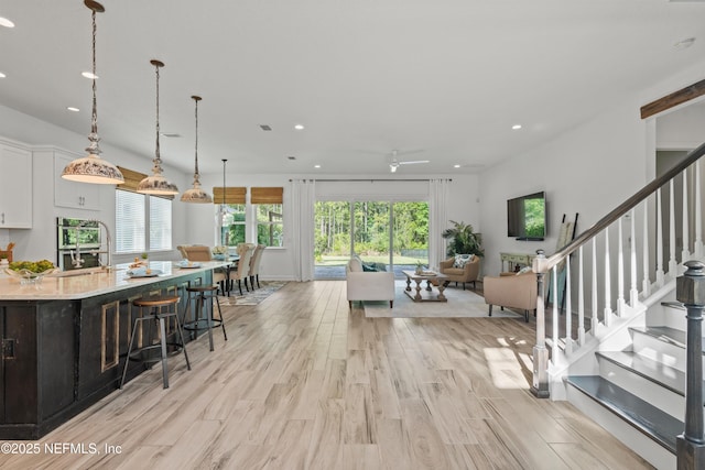 21 Mollusk Rd, Saint Johns, FL 32259 - living room with light wood-style floors, a ceiling fan, recessed lighting, and a healthy amount of sunlight