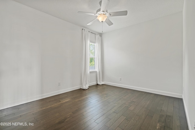 21 Mollusk Rd, Saint Johns, FL 32259 - spare room with baseboards, dark wood-style flooring, and ceiling fan