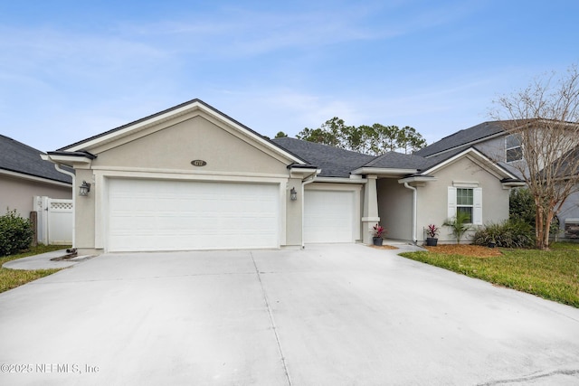 single story home featuring a garage