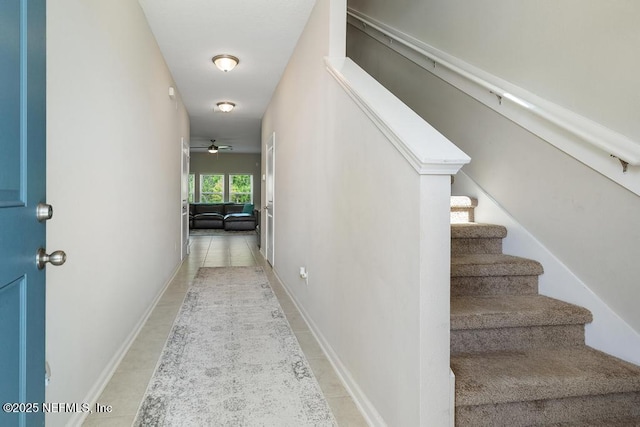 hallway featuring light tile patterned flooring