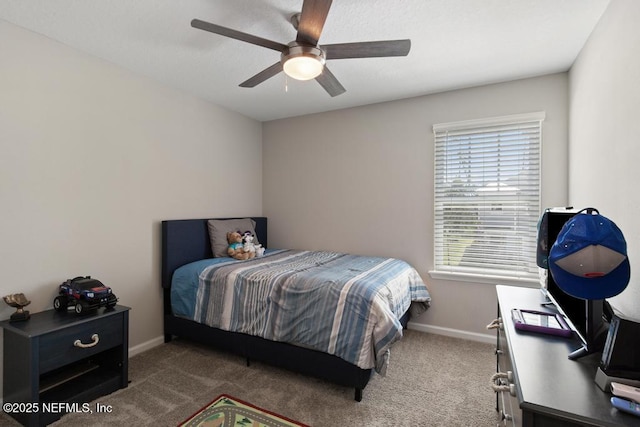 carpeted bedroom with ceiling fan