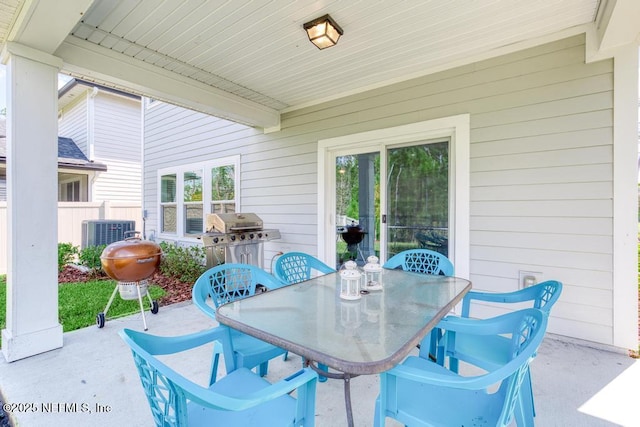 view of patio / terrace with a grill and central AC unit