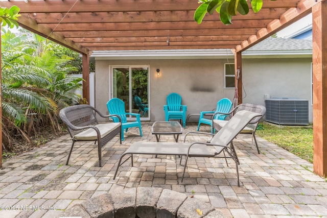 1045 17th St N, Jacksonville Beach, FL 32250 - view of patio featuring central AC and a pergola