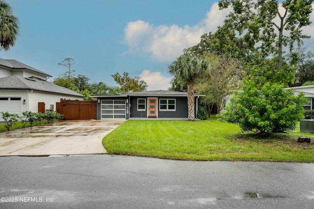 single story home featuring a front yard