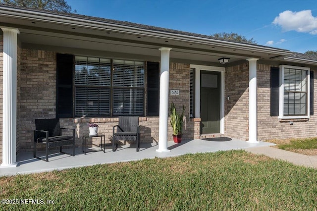 property entrance featuring covered porch