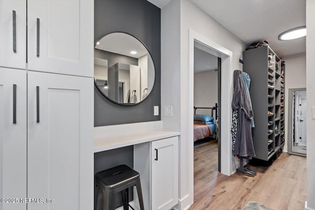 bathroom featuring hardwood / wood-style flooring and vanity