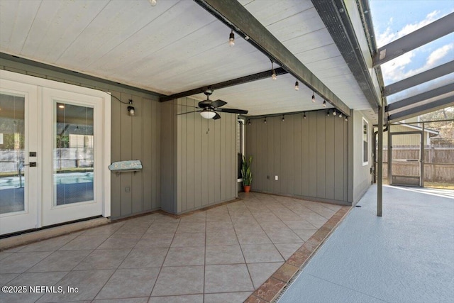 view of patio with french doors and ceiling fan