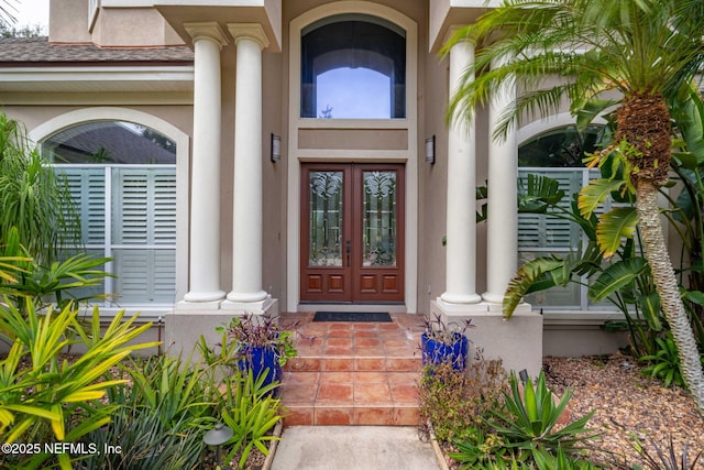 doorway to property featuring french doors