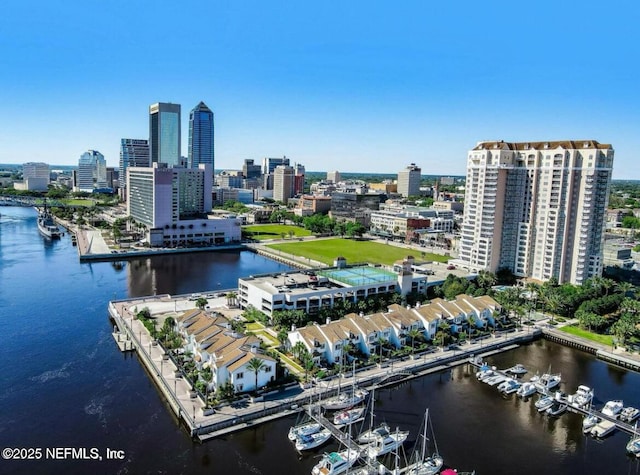 birds eye view of property featuring a water view