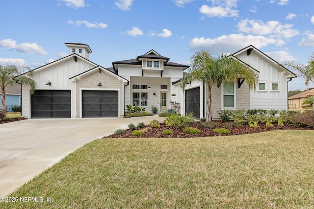 modern farmhouse style home with a garage and a front lawn