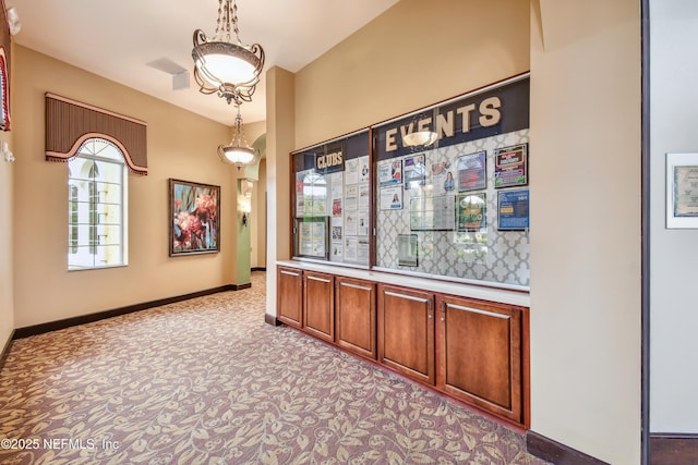 interior space with light colored carpet