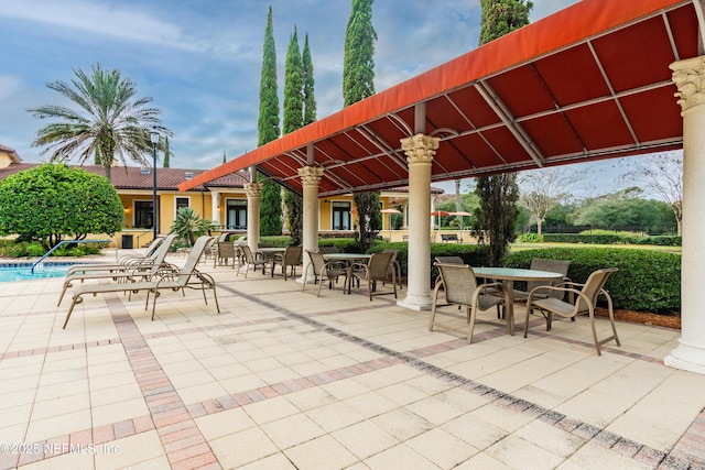 view of patio with a community pool