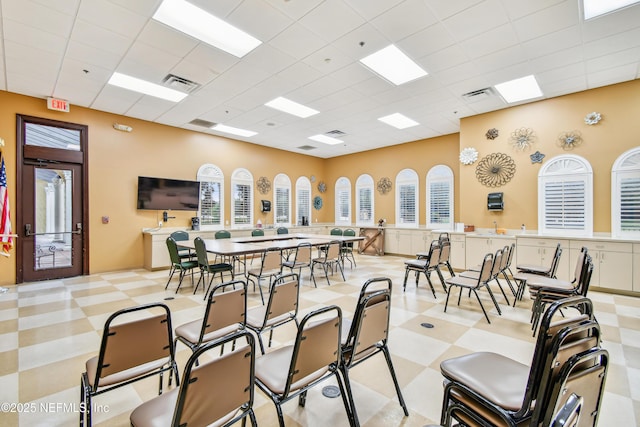 interior space featuring a drop ceiling