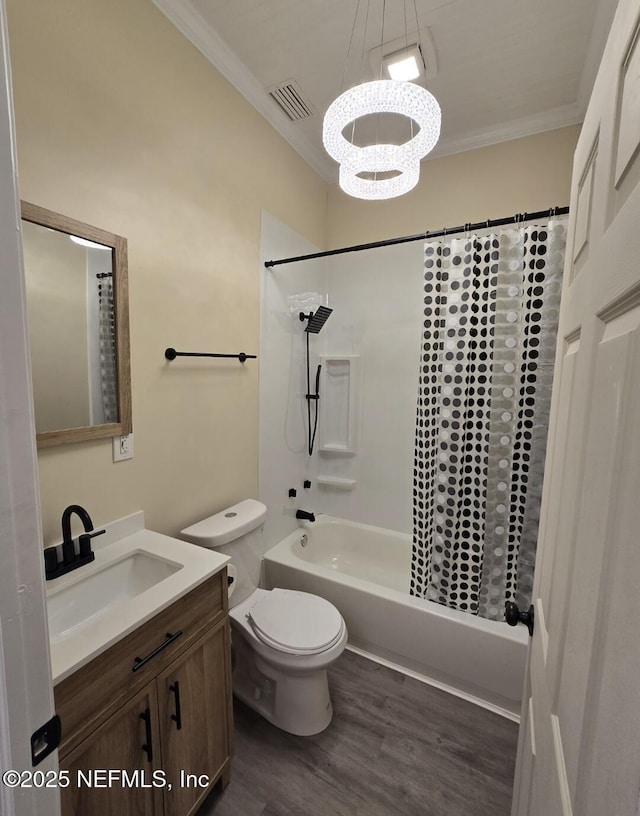 full bathroom with crown molding, vanity, toilet, and hardwood / wood-style floors