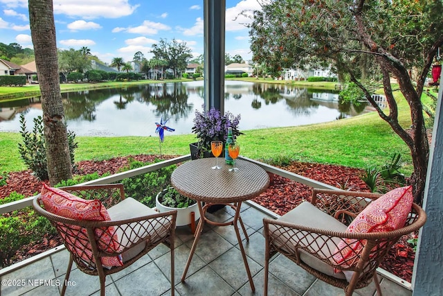 exterior space with a water view