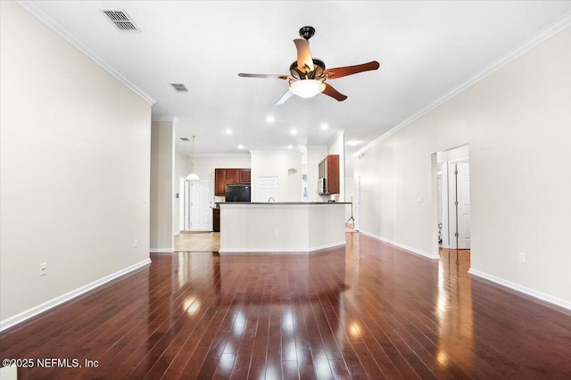 unfurnished living room with ceiling fan, dark wood-type flooring, and ornamental molding