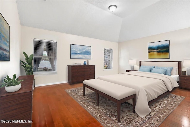 bedroom with dark wood-type flooring and vaulted ceiling