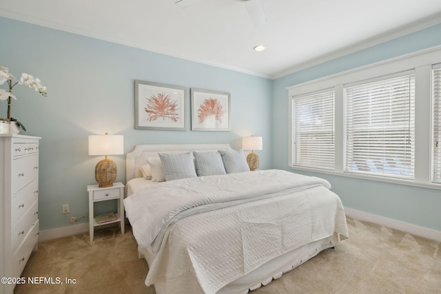 bedroom featuring crown molding, carpet floors, and baseboards