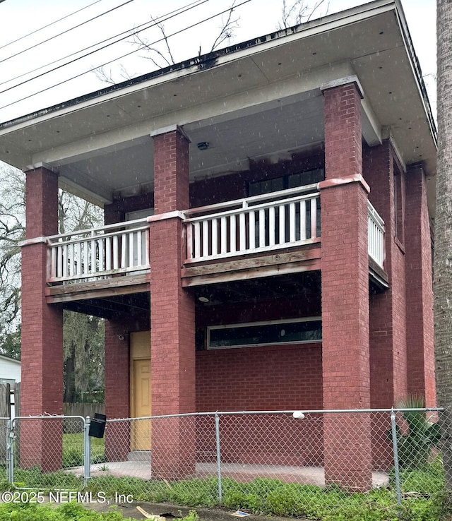 view of property featuring fence