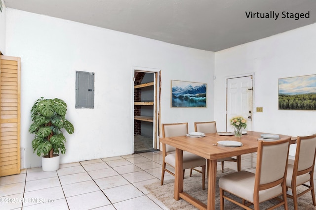 1360 Hart St, Jacksonville, FL 32209 - dining room with light tile patterned floors and electric panel