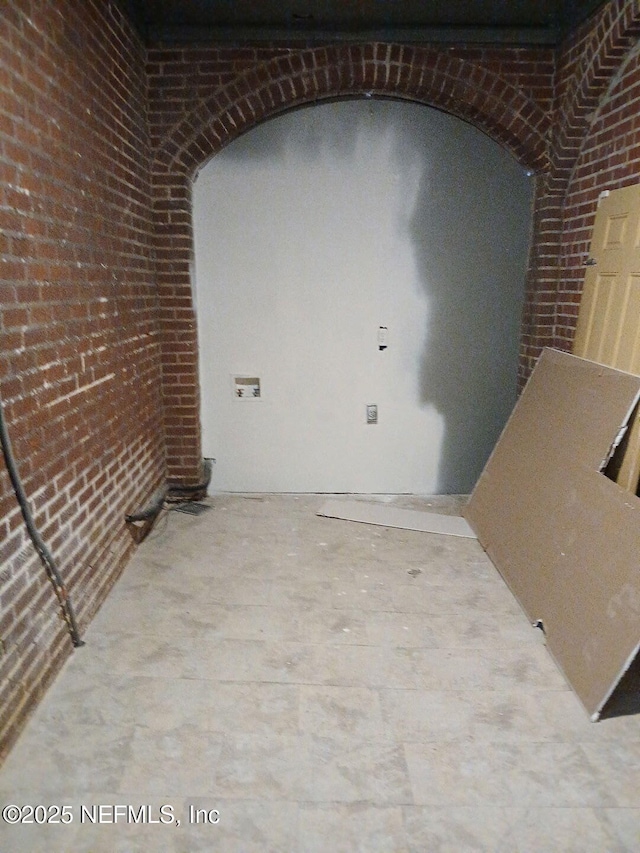 1360 Hart St, Jacksonville, FL 32209 - empty room featuring brick wall
