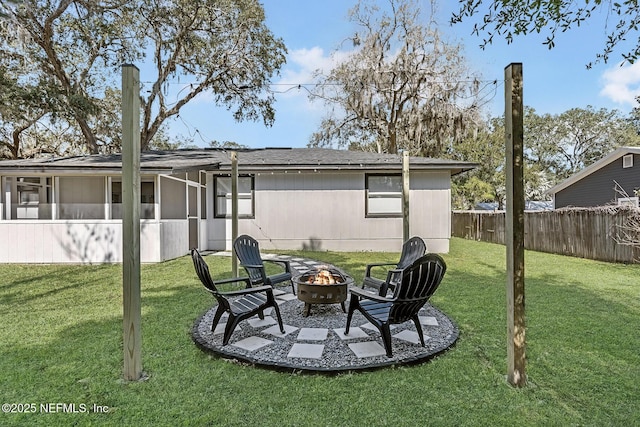 view of yard with an outdoor fire pit