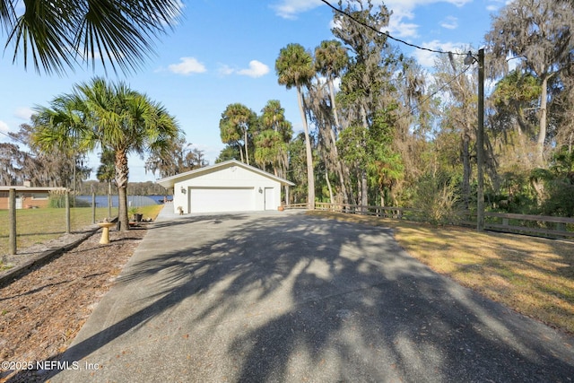 view of property exterior featuring a garage