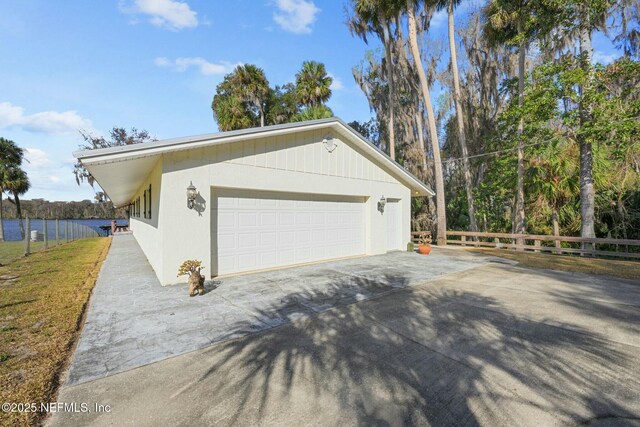 view of property exterior with a garage