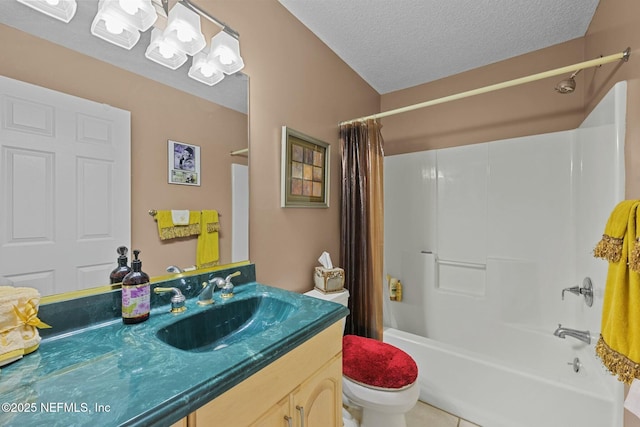 full bathroom with shower / tub combo with curtain, vanity, a textured ceiling, tile patterned floors, and toilet