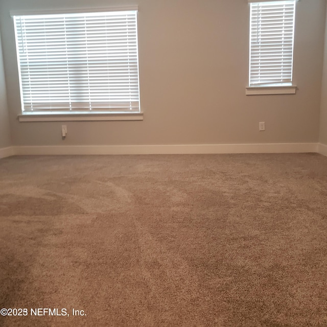 11107 Quasar Ct, Jacksonville, FL 32256 - unfurnished room featuring carpet floors and baseboards